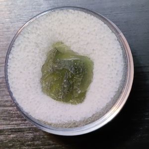 Genuine Moldavite fragment from Czech Republic in mini display case #038